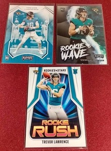 lot 50 image: (3) Trevor Lawrence Rookie Cards