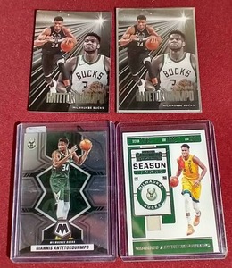 lot 120 image: (4) Giannis Antetokounmpo Cards