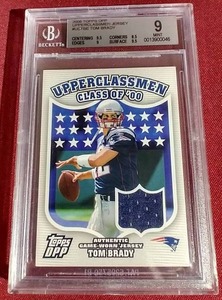 lot 157 image: 2006 Topps DPP Tom Brady Game-Worn Jersey Card - BGS 9