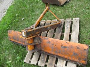 Road grading style plow attachment...