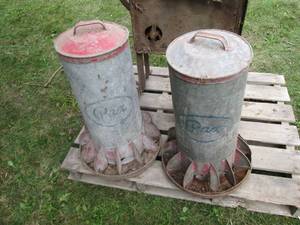 Pair of Pax metal chicken feeders...