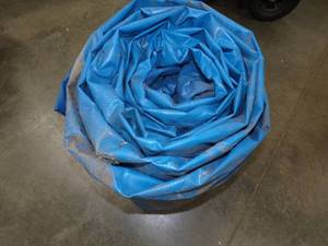 Large Tarp Good for Woodpile may have holes or rips