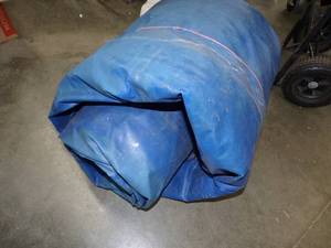 Large Tarp Good for Woodpile may have holes or rips