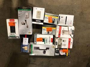 lot 37 image: Lot of assorted Door Knobs and hardware various models and conditions open boxes see pictures