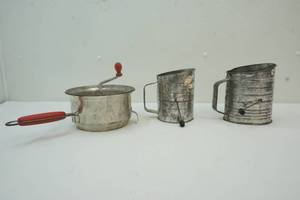 lot 74 image: intage Foley food grinder and flour sifters.