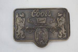lot 92 image: Coors belt buckle