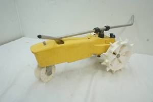 lot 231 image: Walking Tractor Lawn Sprinkler