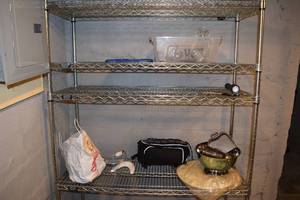 lot 82 image: Shelf with contents