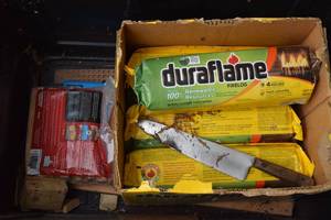lot 14 image: Bin with Fire Logs and Knife