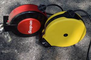 lot 40 image: Pair of Wind-Up Electrical Extension Cords