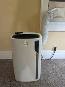 lot 74 image: Delongi Standalone AC with Remote
