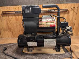 lot 109 image: Coleman Powermate Contractor Air Compressor