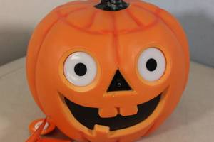lot 33 image: Hyde & EEK Motion Activated Color Changing Light Up Jack-O-Lantern Halloween Decoration