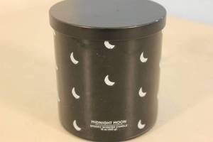 lot 186 image: Hyde and Eek Scented Candle Midnight Moon Black White Moons Halloween Scented 2 Wick (Smells quite nice)