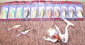 lot 22 image: Rapala crankbaits and Flueger fishing reel set.