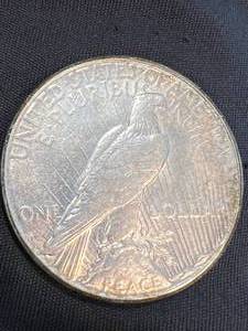 lot 25 image: 1928-S US SILVER PEACE DOLLAR