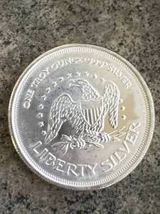 lot 40 image: 1 TROY OZ .999 FINE SILVER LIBERTY ROUND