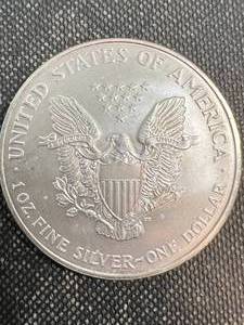 lot 47 image: 1998 AMERICAN SILVER EAGLE 1 TROY OZ .999 FINE SILVER