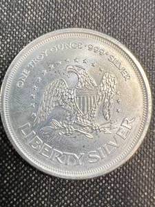 lot 55 image: 1 TROY OZ .999 FINE SILVER LIBERTY ROUND