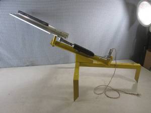 lot 9 image: (EC1) Clay TargetPiegon Thrower - ...