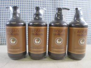 lot 26 image: (EC1) 4 Pump Bottles of Argan Dia B...
