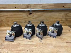 lot 24 image: BETTER HOMES & GARDENS Lot of 4- Tabletop Torches