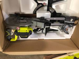 RYOBI 15 Amp 10 in. Corded Sliding Compound Miter Saw with LED Cutline Indicator customer Return see pictures