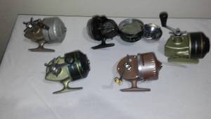 lot 521 image: Shakespeare 1700 and 7500 and South Bend 66.  All for parts or fixing.