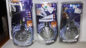 lot 610 image: Waterpik Shower Heads.