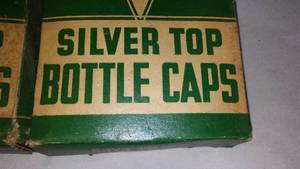 lot 614 image: Vintage Silver Top Bottle Caps. 3 boxes of 144 each.