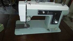 lot 748 image: Sear Kenmore Sewing Machine and Cabinet