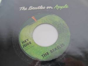 lot 11 image: The Beatles on Apple 45 w Sleeve- Hey JudeRevolution 