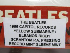lot 41 image: The BEATLES Yellow SubmarineEleanor Rigby 45 Record wSleeve