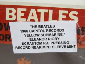 lot 42 image: The BEATLES Yellow SubmarineEleanor Rigby