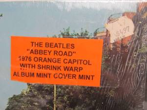 lot 64 image: The BEATLES Abbey Road w Shrink Wrap Cover