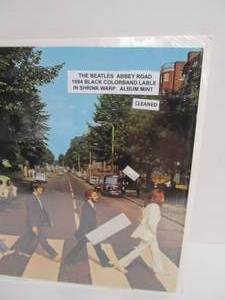 lot 65 image: The BEATLES Abbey Road w Shrink Wrap Cover