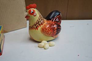 lot 185 image: Hen Laying eggs