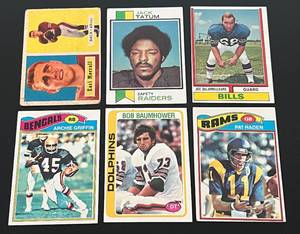 lot 258 image: NFL Vintage RC Lot of 6 - 1957 Earl Morrall #104, 1973 Jack Taturm #288, 1974 #183 Joe DeLamielleure, 1977 # 269 Archie Griffin and #18 pat Haden, and 1978 #466 Bob Baumhower