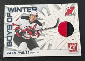 lot 346 image: Zach Parise Jersey Relic 100 - 2010-11 Donruss Boys of Winter #73 numbered 86100 rare only 100 made, Minnesota Wild Hockey Card