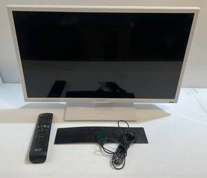 lot 12 image: 23 Quaser RC7010Q TV With Remote (Works)