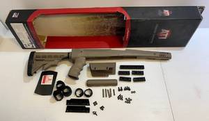 lot 17 image: ATI SKS 6 Position Side Folding Stock Desert Tan (Used) With Original Box