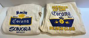lot 64 image: Two Corona Items 1 Jacket Size 44 1 Slip Over Hoodie Size XL