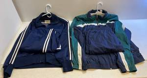 lot 100 image: Two Warm Up Suits 1(NIB) Size (XL) 1 Navy With White Stripes Size (M)