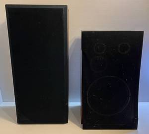 lot 139 image: Two Misc. Large Box Speakers 1 Bose (Works But Has Statiic) 11D X 14 12W x 32 T 1 JCPenney  (Works) 26T x 14 34W x 11 14D (Front Cover Needs Repair Comes Off)