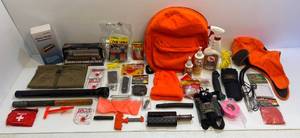 lot 142 image: Group Of Misc. Hunting Items With Backpack, Deer Scent, Gerber Hand Saw And More