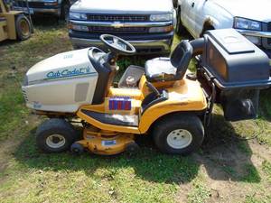 lot 100 image: Cub Cadet riding mower with dual bagger. Model 2146. Shaft drive. Used condition. Tested & works. As shown. THIS ITEM HAS A RESERVE.