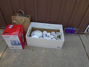 lot 115 image: Box of christman plates, lights & humidifier. As shown.