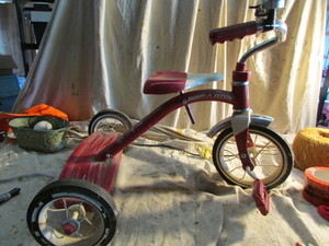 lot 113 image: Tricycle and Helmet