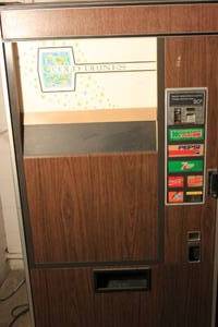 lot 2 image: VINTAGE Vendo Soda Can Vending Machine, Dispenses, Collects Money, Does Not Get Cold Can Dispense 7 Varieties of Cans 70x38x25 Operators Manual Included