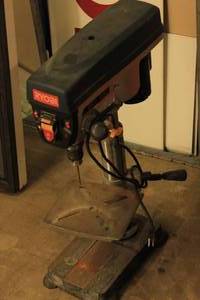 lot 53 image: Ryobi DP102L Drill Press - Start Cap Beginning to fail